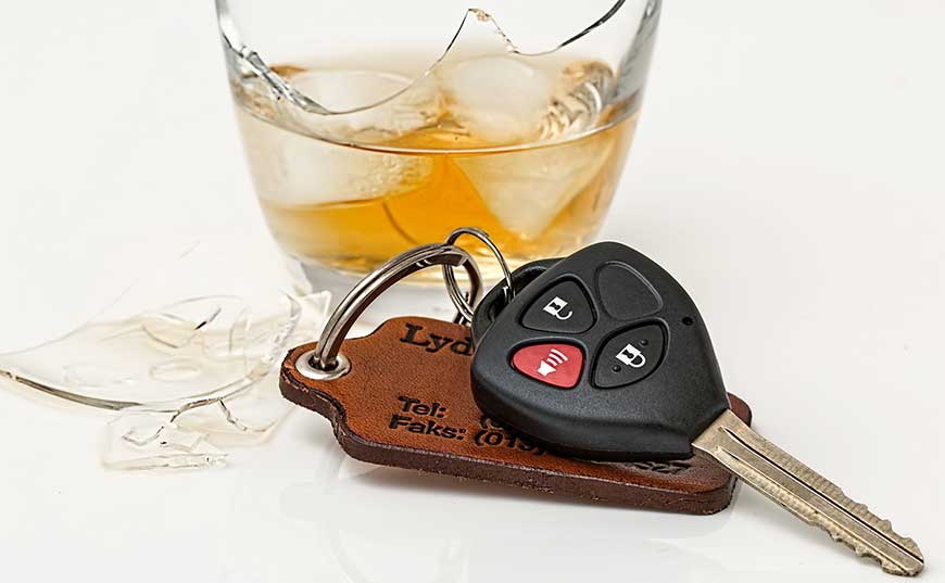 Car keys and an alcoholic drink