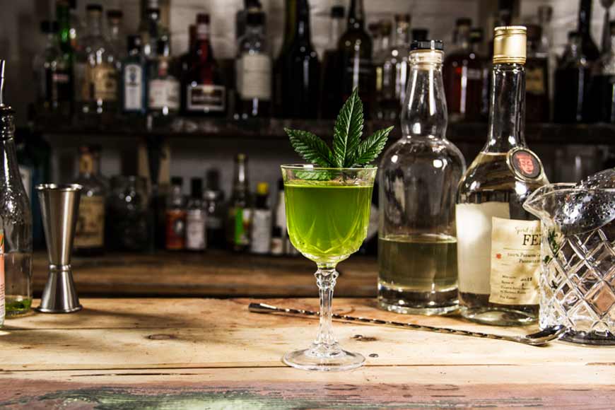 Absinthe Drink With a Leaf of Cannabis
