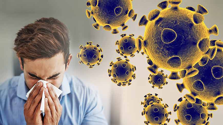 くしゃみをする男性-コロナウイルスの予防治療