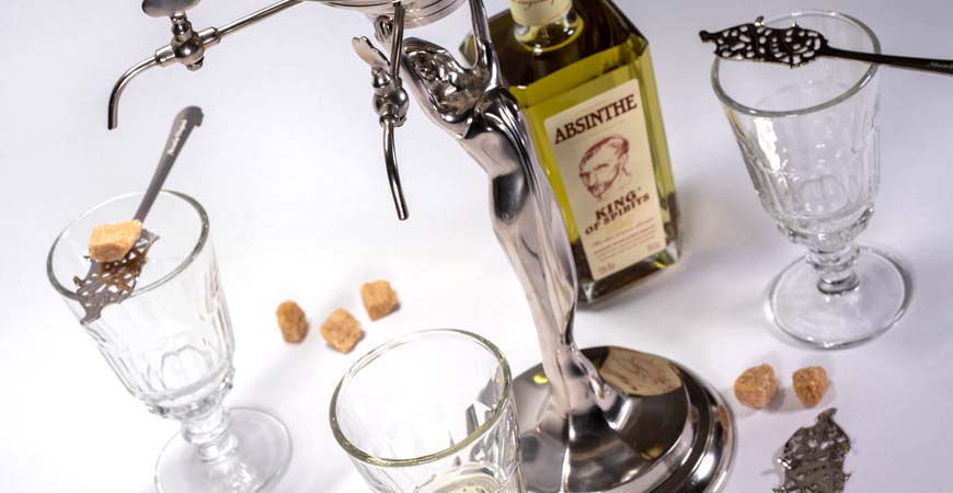 Silver Absinthe Dispenser with Glasses of Absinthe, Spoons, and Bottle Lady Style