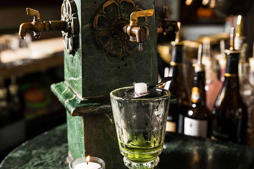 Absinthe Fountain with Sugar, Spoon and Absinthe Drink