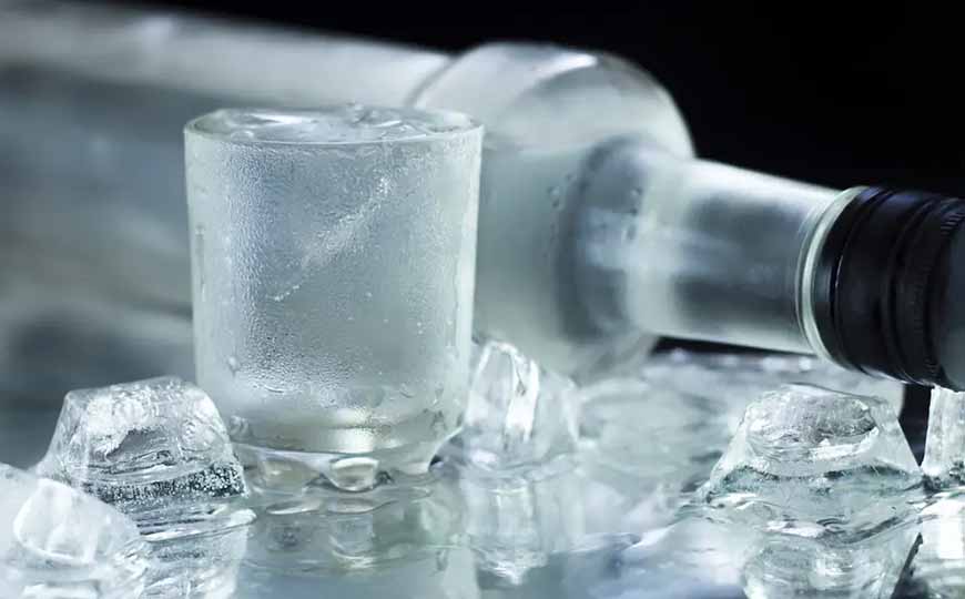 Frozen Bottle Of Vodka With Ice