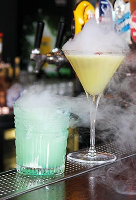 Two Mysterious Absinthe Drinks Two Glasses with Mysterious Absinthe Drinks