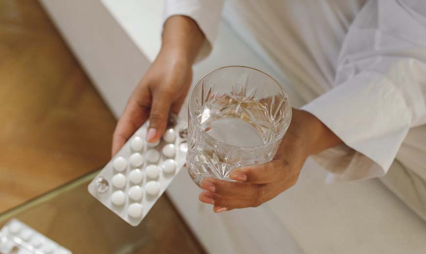 Anti Hangover Pills With Glass of Water